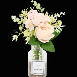 Kunstbloemen in glazen fles