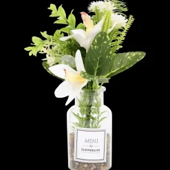 Kunstbloemen in glazen fles